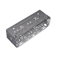 Indbygningsramme i metal til JVC bilstereo med ventilationshuller og monteringsåbninger, velegnet til installation i bilpaneler.